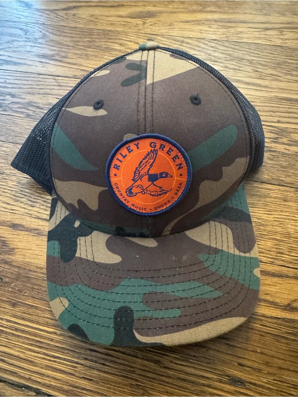 Riley Green (Country music) TOUR Camo Trucker Hat with Orange Patch